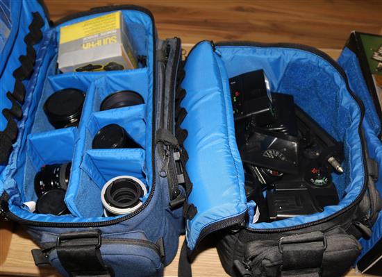 An Acuter ST20 field scope, two cases, lenses, etc.